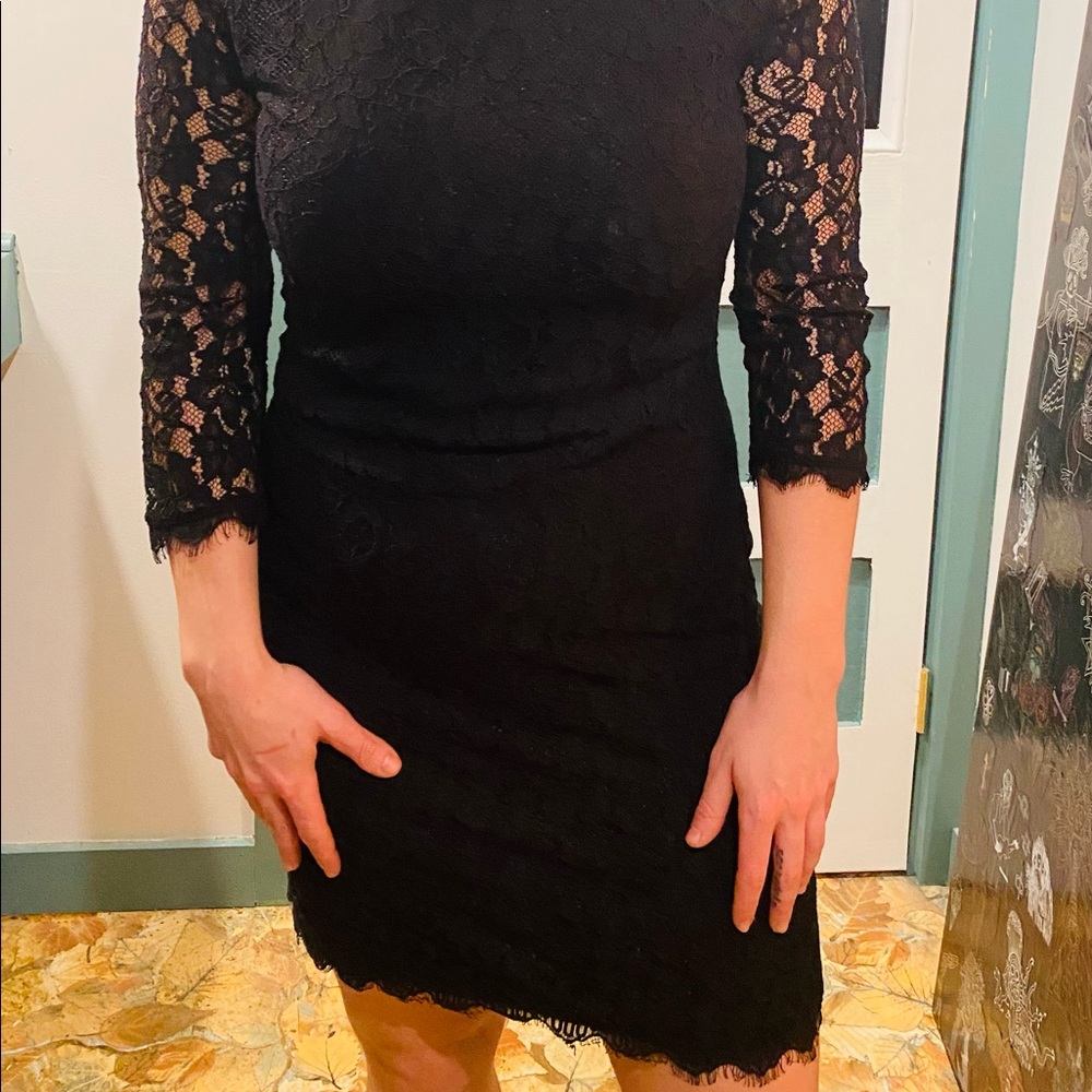 Sexy, formal, black lacey Diane von Furstenberg dress with 3 quarter sleeves